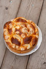 Festive baked bread on table background/Traditional festive bread