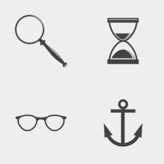 Set of monochrome icons. Magnifying glass, hourglass, anchor, glasses.