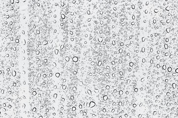 Drops of rain on window white background