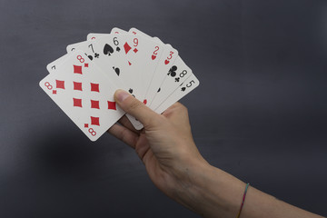 wasting money playing cards