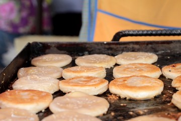 Thailand dessert, Mix flour, coconut and then fried.
