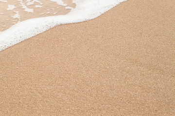 wave of sea on sandy beach