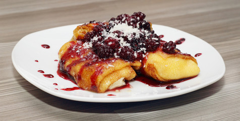 delicious pancakes with berry jam