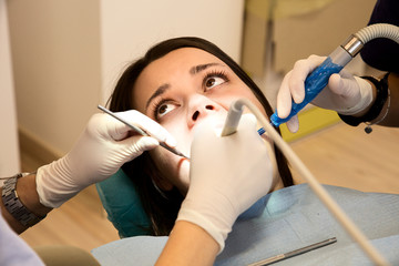Woman getting dental surgery