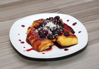 delicious pancakes with berry jam