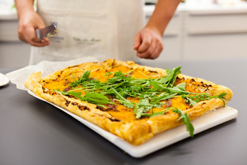Delicious pie with potato,ruccola and cheese