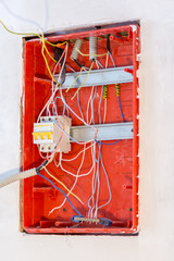 unfinished work on electrical panel installation