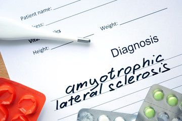 Diagnosis Amyotrophic lateral sclerosis (ALS) and tablets. Medicine concept.