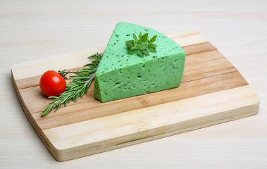 Green pesto cheese and basil leaves