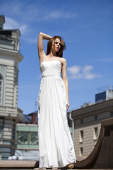 Obraz premium Full length portrait of beautiful model woman with long legs wea