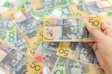 Young girl's hand hold banknote texture and background.