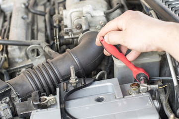 The process of tightening bolts to fix