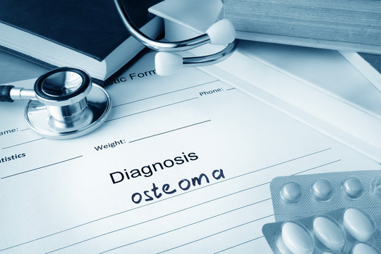Diagnostic form with diagnosis osteoma and pills.