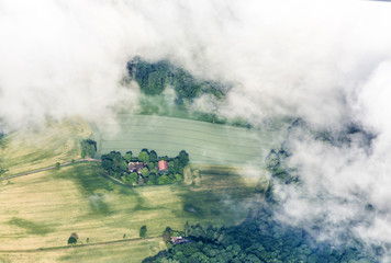 Fototapeta na wymiar aerial of rural landscape in Hamburg by approaching Hamburg airp