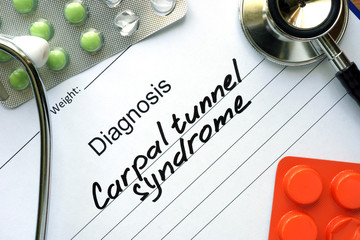 Diagnostic form with diagnosis Carpal tunnel syndrome and pills.