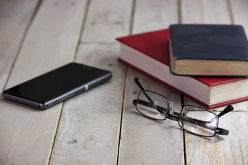 Books on an old wooden surface