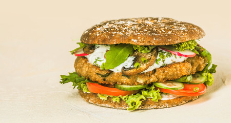 Close up Gourmet Hamburger with Veggies and Cheese