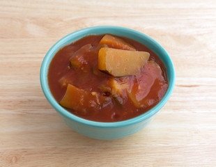 Chunks of zucchini in tomato sauce in bowl