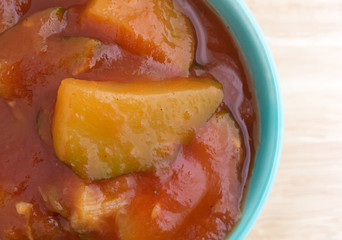 Zucchini in tomato sauce in bowl