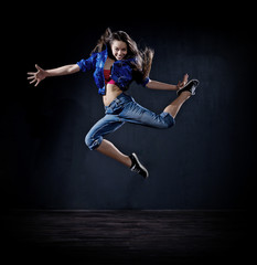Fototapeta na wymiar Girl modern dancer (dark version)