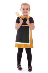 Girl playing on wooden spoons