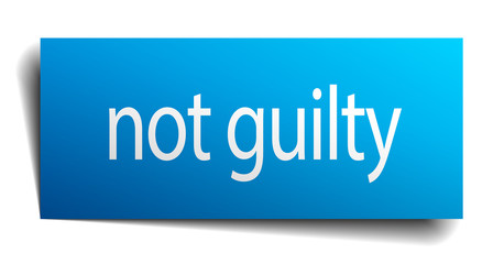 not guilty blue paper sign on white background