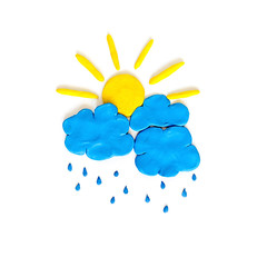 Niimbus and sun. Rain cloud and sun made from plasticine