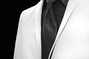 white wedding tuxedo with black shirt and tie