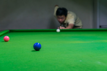 Training to become a champion snooker.