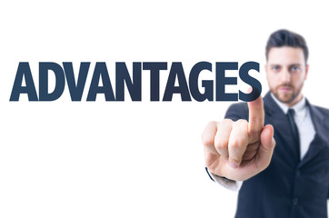 Business man pointing the text: Advantages