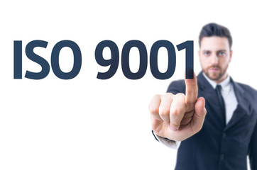 Business man pointing the text: Iso 9001