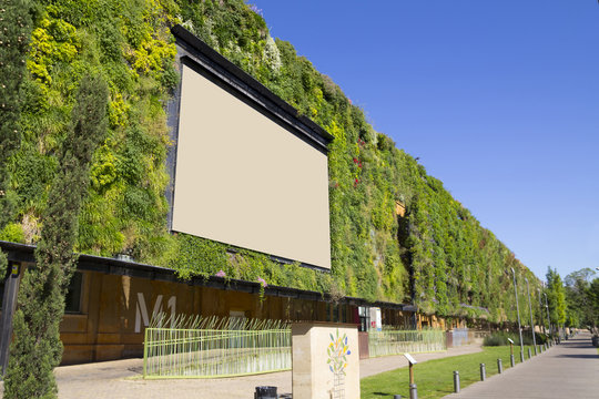 Blank Billboard In A Green Building