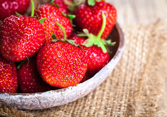 fruit. Fresh strawberries on old wooden background