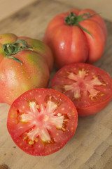 Fresh red tomatoes cut close up