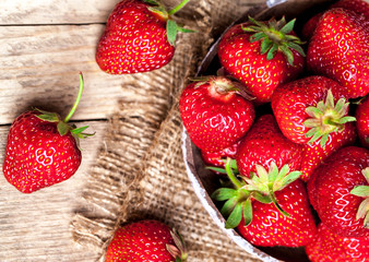 fruit. Fresh strawberries on old wooden background