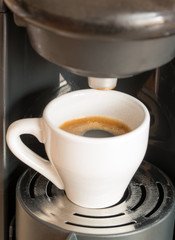 cup of espresso / a cup of espresso is brewed