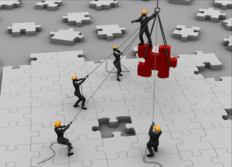 Team building a great jigsaw puzzle