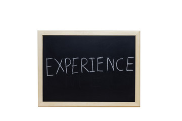 EXPERIENCE written with white chalk on blackboard.