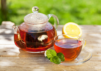 Breakfast tea on table in garden