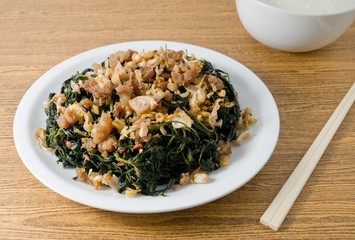 Stir Fried Jute Leaves with Rice Gruel