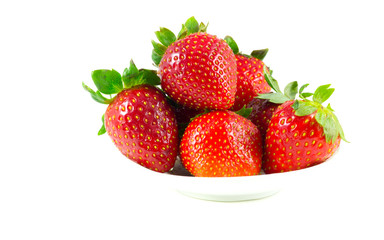 Several strawberries on a saucer
