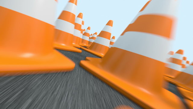 Flying over the field covered by endless traffic cones
