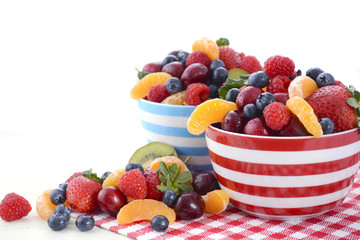 Fresh colorful fruit in breakfast bowls