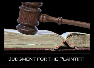 Gavel and legal reference book. Judgment for the Plaintiff.