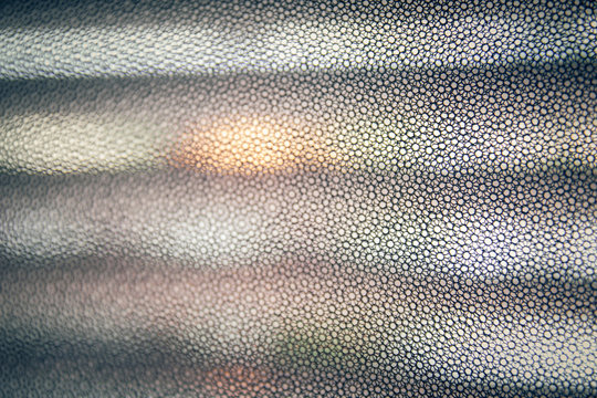 Hexagonal pattern - Black mesh pattern with a narrower focus.
Colors of the sunset.