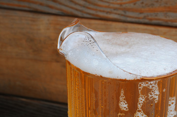 Closeup of Beer Pitcher with Wood Background