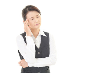頭痛に悩む女性