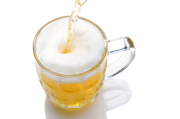 Beer Pouring into Mug