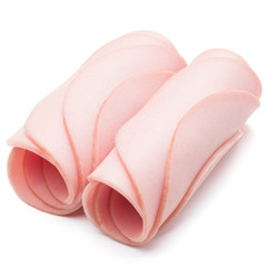 cooked boiled ham sausage or rolled bologna slices isolated on w