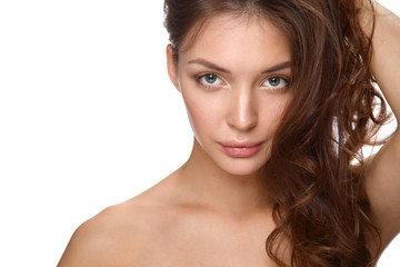Obraz premium Close up portrait of beautiful young woman face. Isolated on